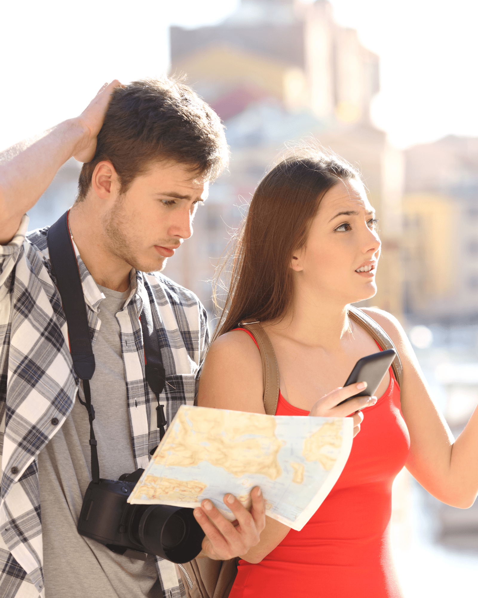 Couple looking at map trying to find their way in a regional town